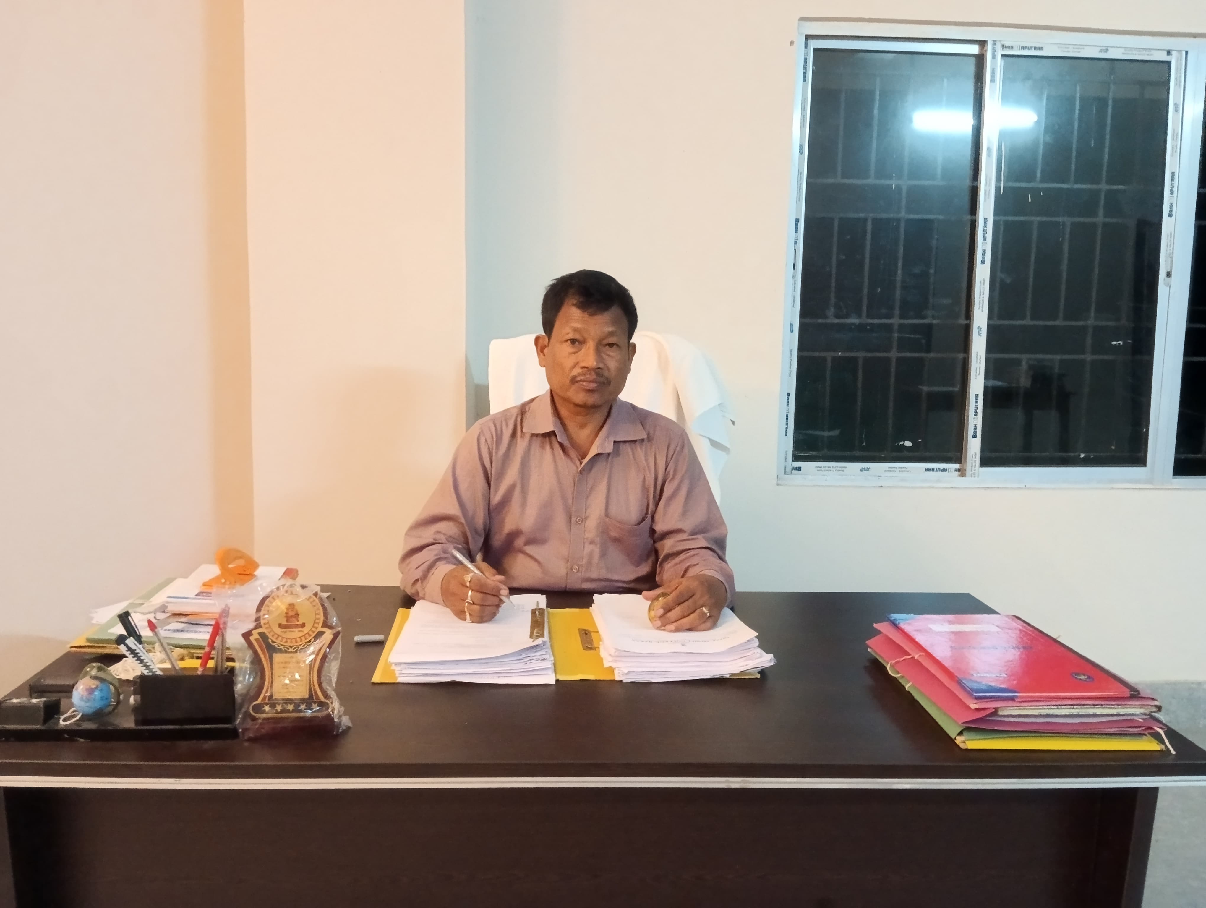 Principal Dr. Maneswar Baro